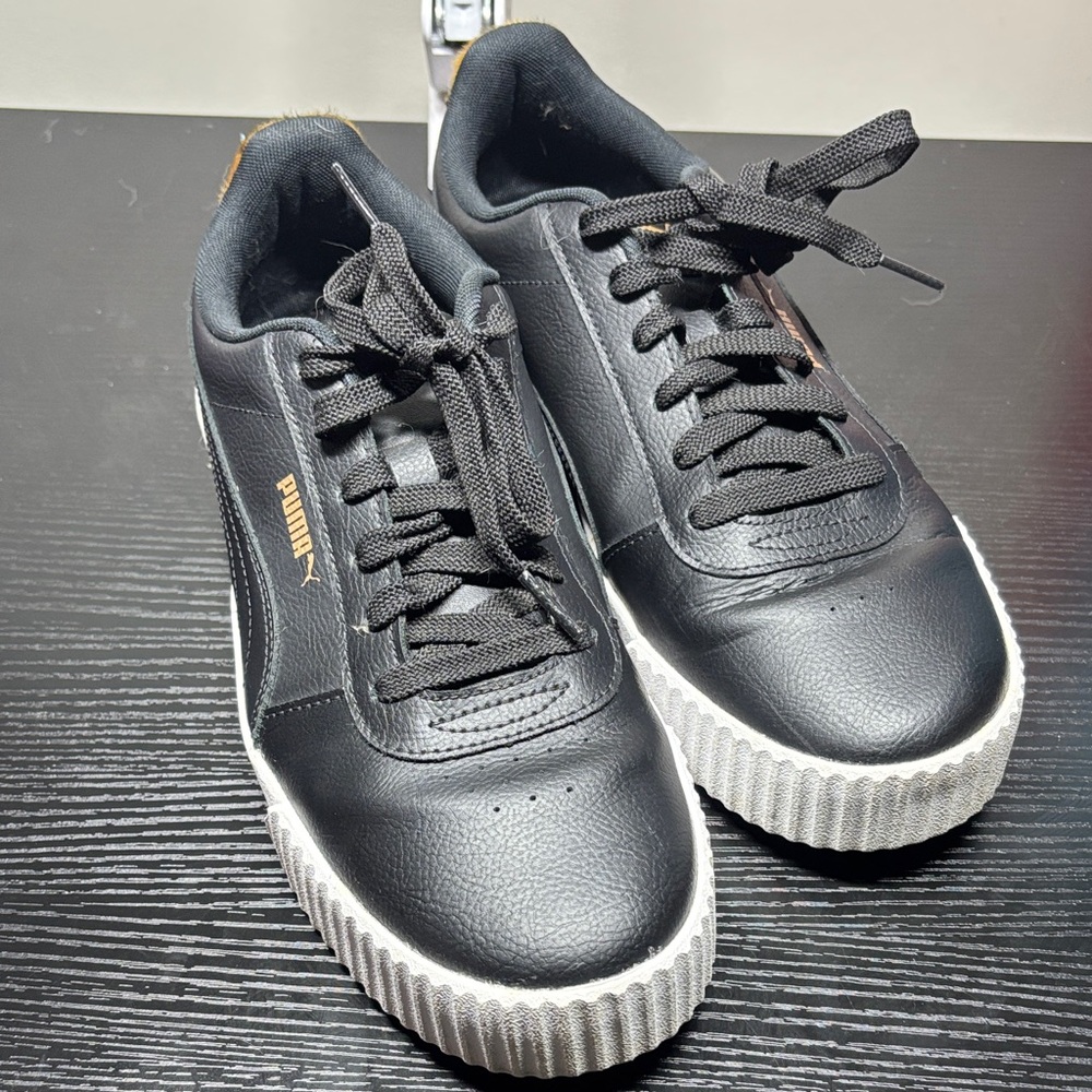 Puma Carina Leo L Black Sneakers with Gold Accents